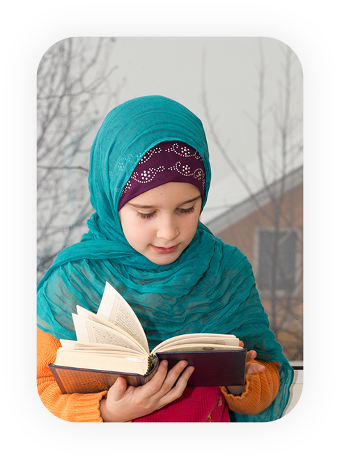 kid reading quran outside